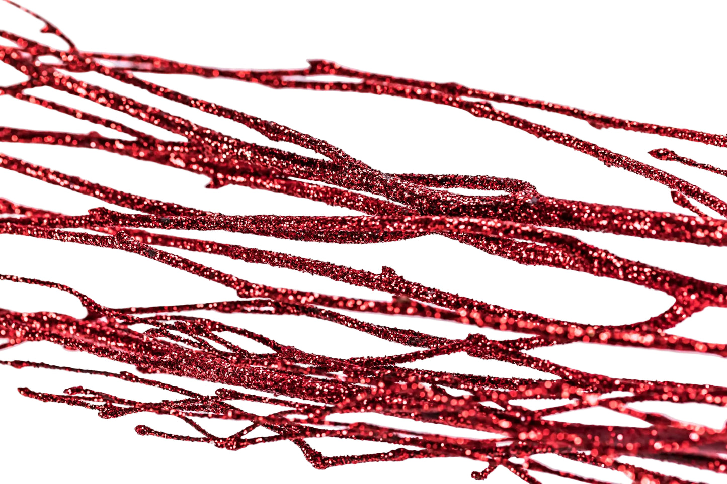Red glittery branches on a white background