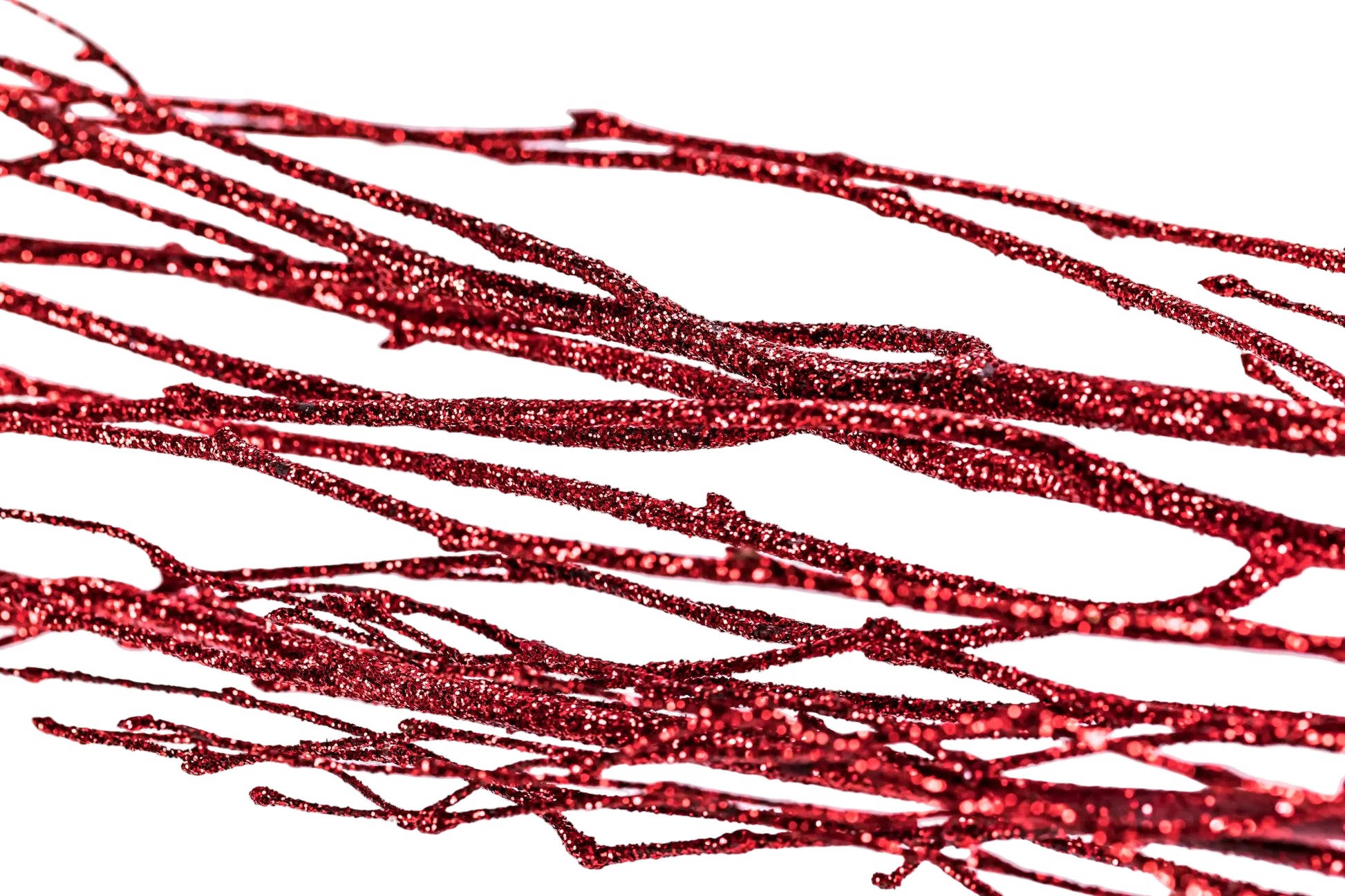 Red glittery branches on a white background